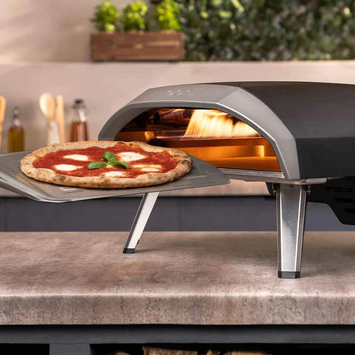 Ooni Koda 16 Gas Powered Pizza Oven with pizza