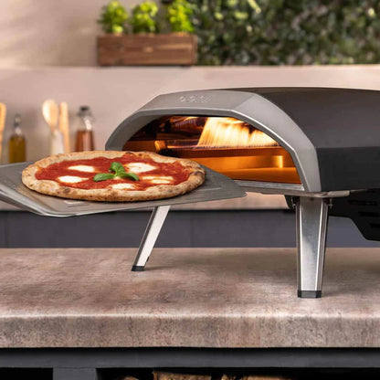 Ooni Koda 16 Gas Powered Pizza Oven with pizza